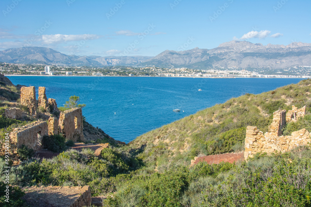 View of Costa Blanca area of Spain with the Mediterranean Sea and the mountains range from Serra Gelada Nature Park in Alfaz del Pi, Spain
