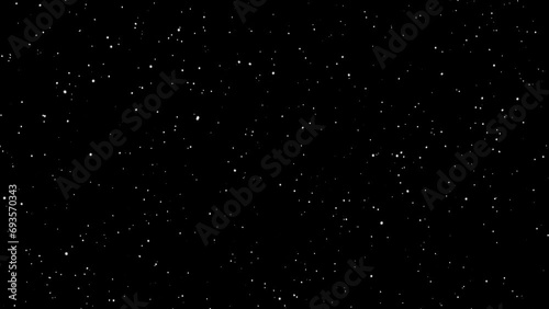 Snowflakes are slowly falling. New Year's background with snowfall. A lot of white particles are moving. High quality 4k footage