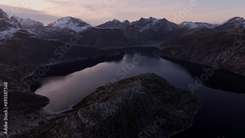 Immerse yourself in the cold splendor of Lofoten Islands with this winter aerial footage from Northern Norway. photo