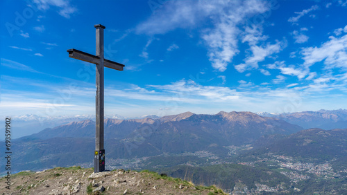 Cross at the top of a mountain in the Swiss Alps