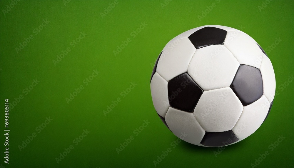 Soccer ball Isolated, green background, text space