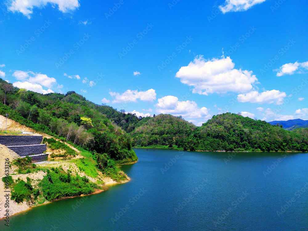 landscape of mountain and lake with blue sky background, Thailand.