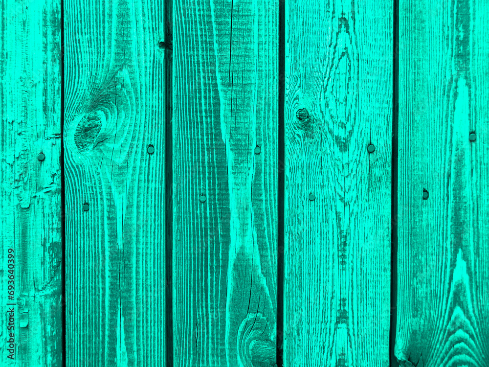 Old plank wooden wall made of boards. Old wooden boards with red nails with peeling paint abstract texture background.