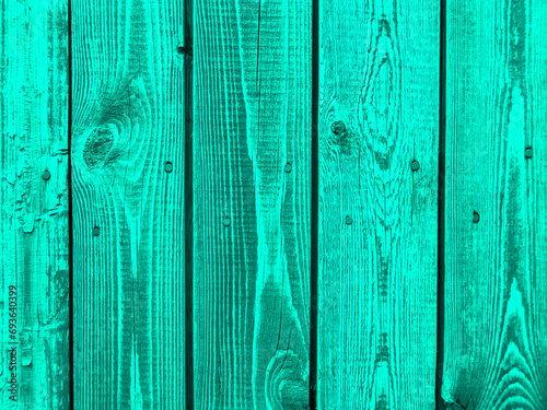 Obraz na płótnie Old plank wooden wall made of boards. Old wooden boards with red nails with peeling paint abstract texture background. w salonie