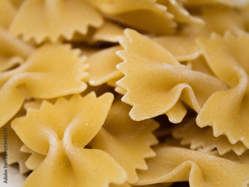 Farfalle Uncooked Pasta Noodles Closeup Macro Photography Farfalle Uncooked Pasta Noodles Closeup Macro Photography