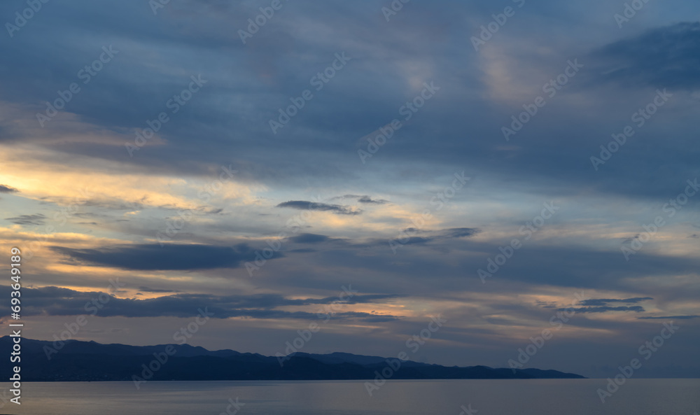 blue sunset sky with clouds over the Mediterranean sea in winter 8