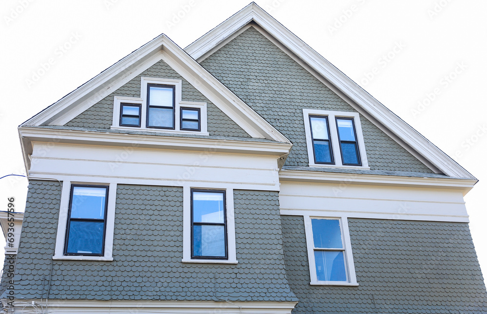 Suburban house, symbolizing increasing mortgage rates and inflation impact on real estate market