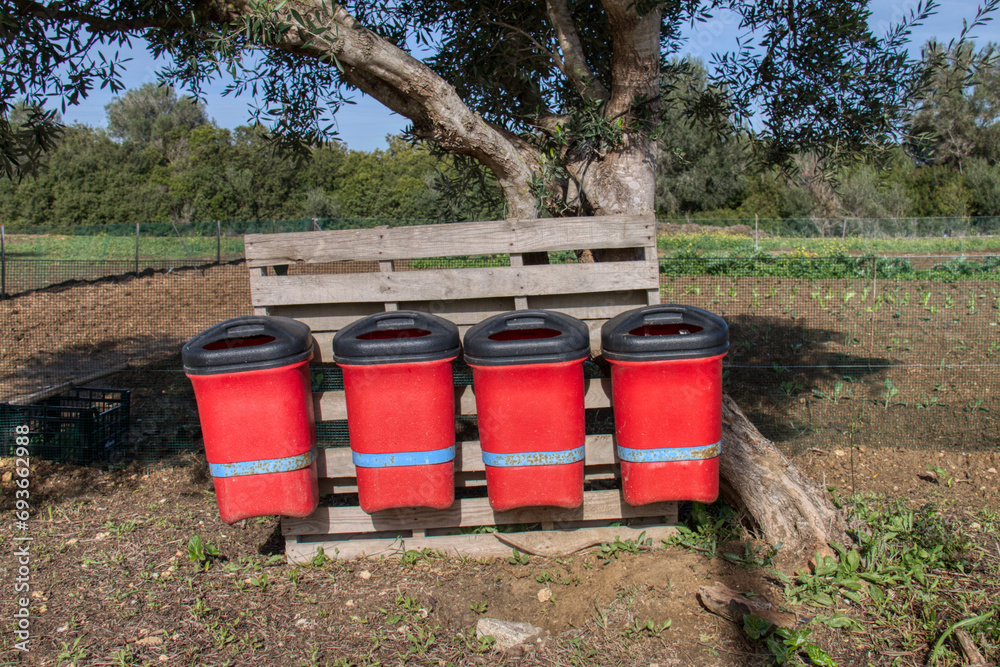 Several containers to selectively deposit waste to be recycled.
