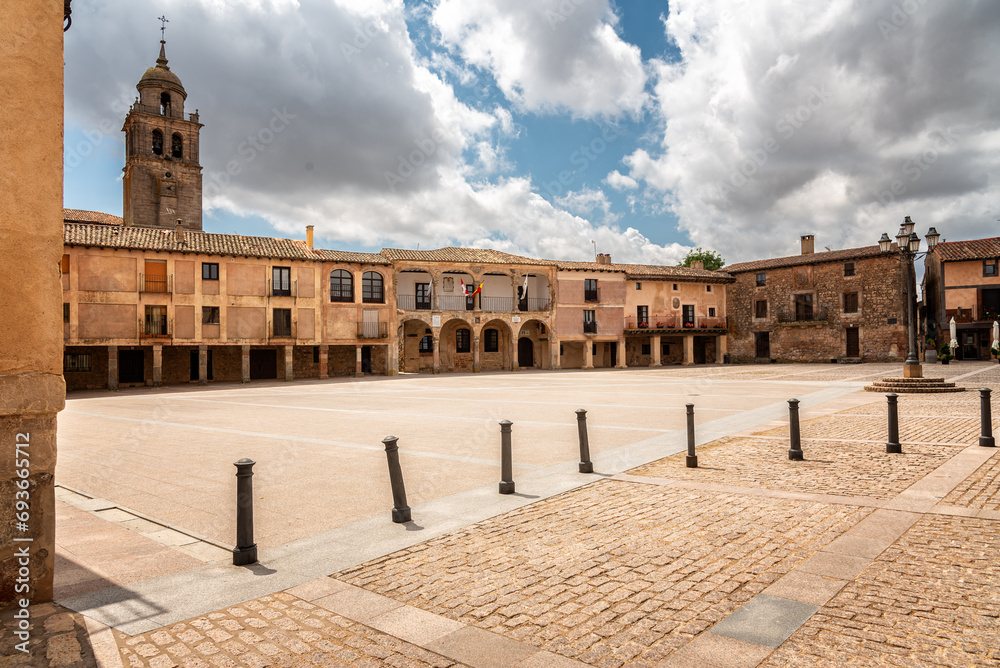 Porticoed main square in the ancient village of Medinaceli on a cloudy day, Soria, Castilla y Leon, Spain,