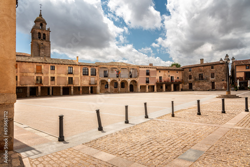 Porticoed main square in the ancient village of Medinaceli on a cloudy day, Soria, Castilla y Leon, Spain, photo