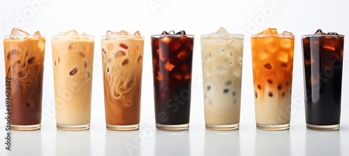 Black iced coffee and ice latte coffee set with milk in tall glass, isolated on white background