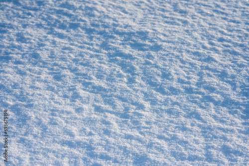 snow surface in frost, blue snow background