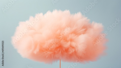A vibrant orange background resembling cotton candy with fluffy clouds floating above.
