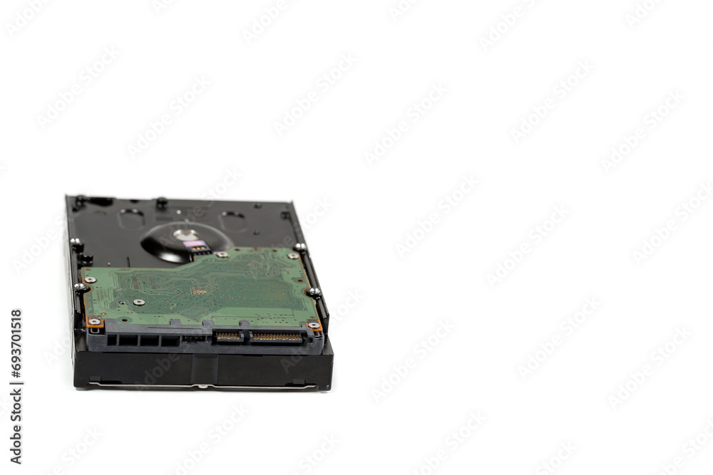 Disassembled hard drive on a white background, hard drive repair Disassembled hard drive on a white background, hard drive repair