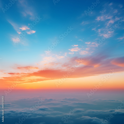 Abstract gradient sunrise in the sky with cloud and blue mix orange natural background.