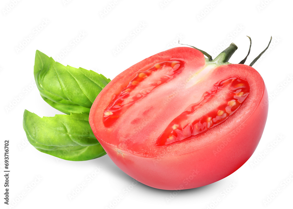 Fresh basil leaves and half of tomato isolated on white Fresh basil leaves and half of tomato isolated on white