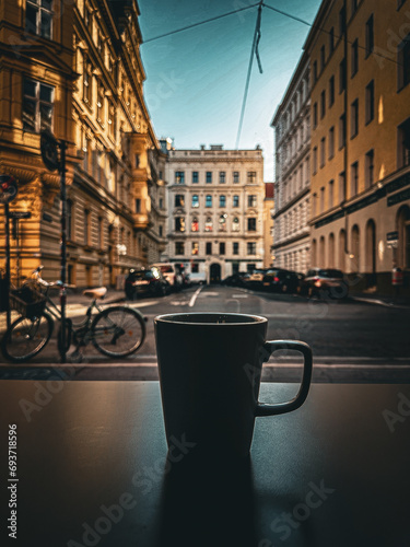 Drinking coffee in Vienna vith view of Vienna's architecture and streets
