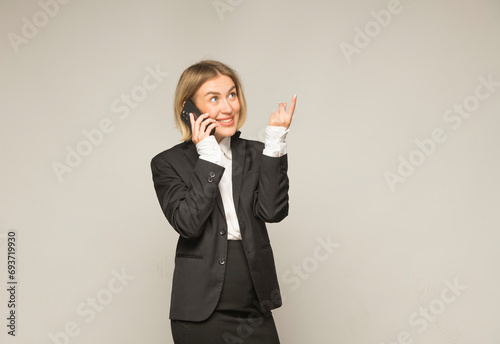 business lady with smartphone on white background
