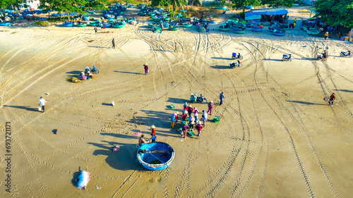 Mui Ne fish market seen from above, the morning market in a coastal fishing village to buy and sell seafood for the central provinces of Vietnam