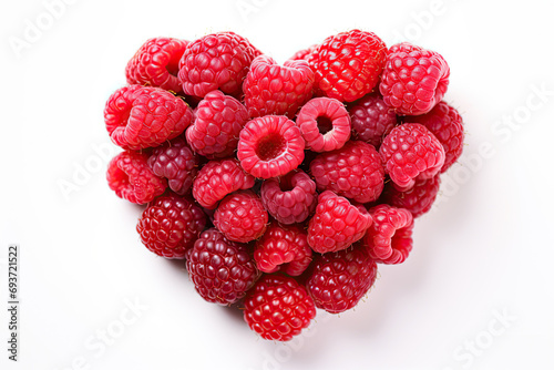 An image of a raspberry in the shape of a heart symbol, resting on a white background with a top-down view.