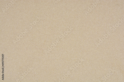 Brown paper texture background, close up kraft brown paper, cardboard texture, carton paper. Paper texture background with soft pattern. Highly detailed paper background photo
