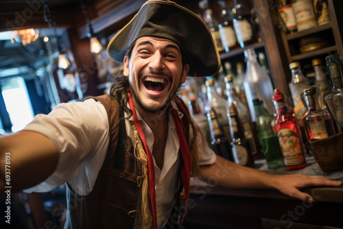 Portrait of a man bartender wearing a pirate costume in a pirate bar photo