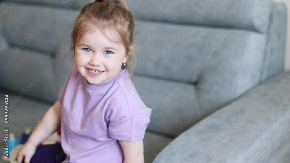 Portrait of a laughing little girl with blue eyes, copy space. Portrait of a laughing little girl with blue eyes, copy space.