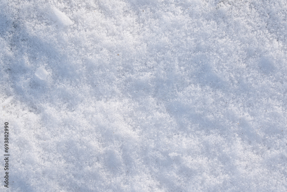 Winter snow. Top view of the snow texture background.