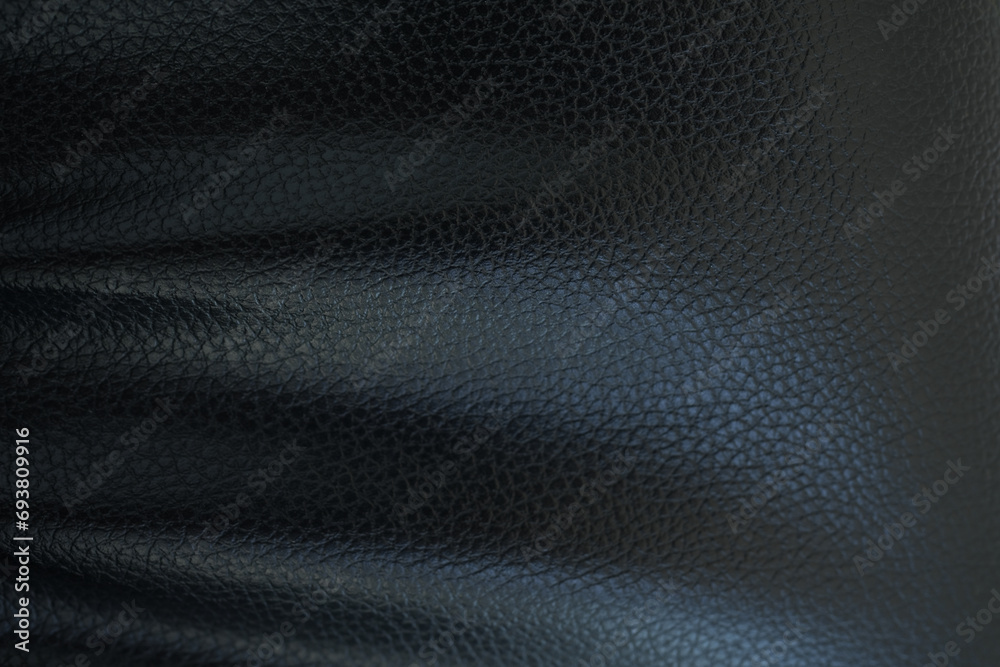 Black background. Leather car seat covers and sofas. Black background. Leather car seat covers and sofas.