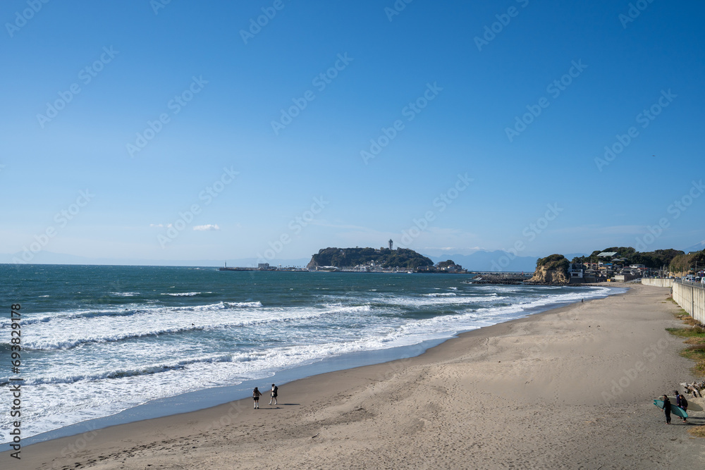 The view of Enoshima from Shichirigahama Beach. Mount Fuji appears in the background