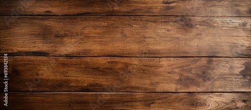 Top-down photo of textured wood floor in house or living space.