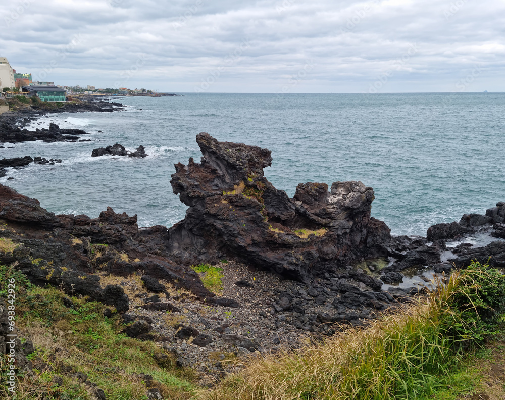 Yongduam Rock is a famous tourist attraction in Jeju Island. Yongduam Rock is a famous tourist attraction in Jeju Island.