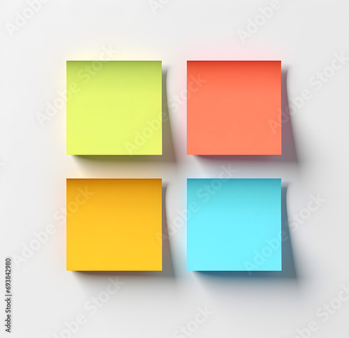 colorful square post it notes on a white background photo