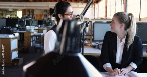 Engineering Precision with Gender Diversity, Male and Female Teams Enhancing Productivity in Project Analysis at office desk