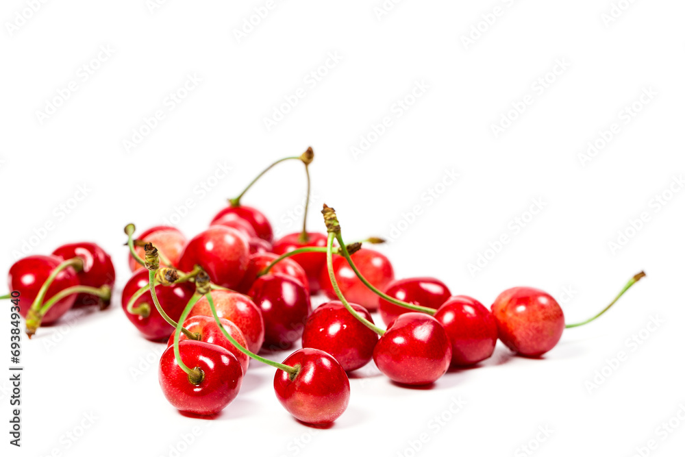 Fresh red cherry berries on a white background, berries for dessert Fresh red cherry berries on a white background, berries for dessert