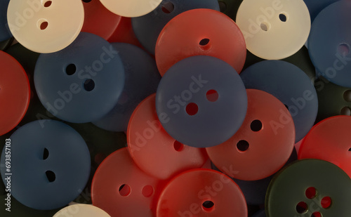 Background of multi-colored plastic buttons  © Valeria F
