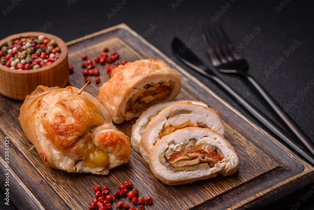 Delicious fresh meat roll made from chicken fillet, mushrooms, spices and herbs Delicious fresh meat roll made from chicken fillet, mushrooms, spices and herbs