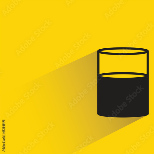 Wallpaper Mural water glass icon with shadow on yellow background Torontodigital.ca