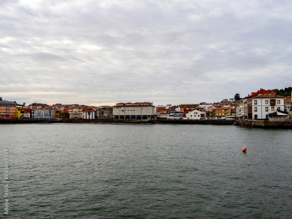 View from the sea of the fishing village of Luanco. Asturias, Spain.