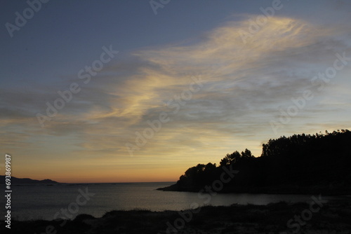 Sunset in the Vigo estuary from Limens beach. Rias Baixas, Galicia, Spain.