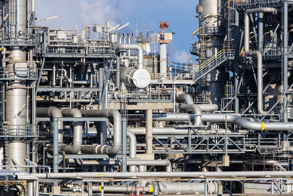 Part of refinery facility with complicated pipe system Part of refinery facility with complicated pipe system