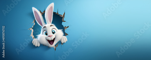 Easter bunny poster peeking out of a hole in the wall with copy space, rabbit jumps out of a torn hole  photo