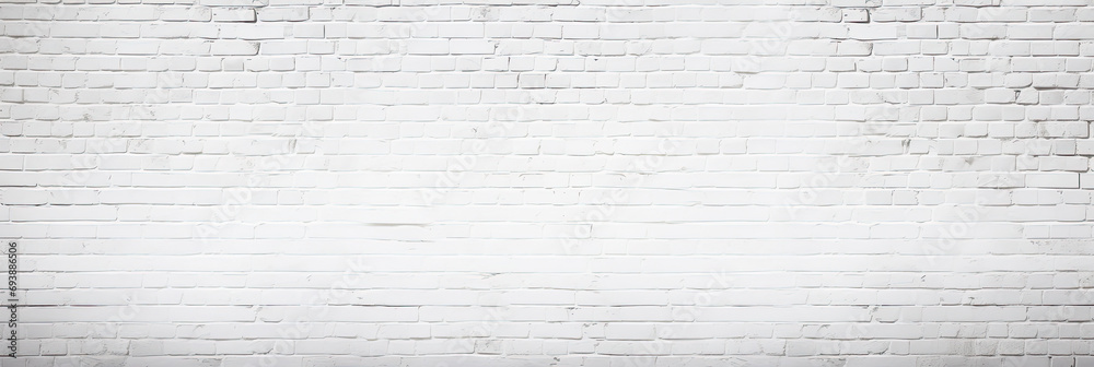 Fototapeta premium Abstract white brick wall texture for pattern background. wide panorama picture.Modern white brick wall texture for background