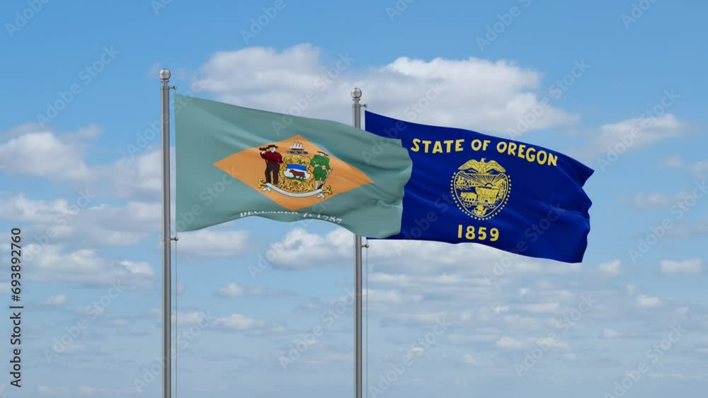 Oregon and Delaware US state flags waving together on cloudy sky, endless seamless loop Oregon and Delaware US state flags waving together on cloudy sky, endless seamless loop