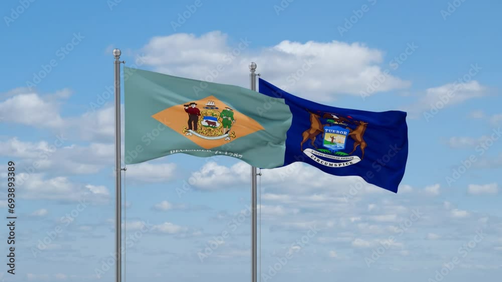 Michigan and Delaware US state flags waving together on cloudy sky, endless seamless loop Michigan and Delaware US state flags waving together on cloudy sky, endless seamless loop