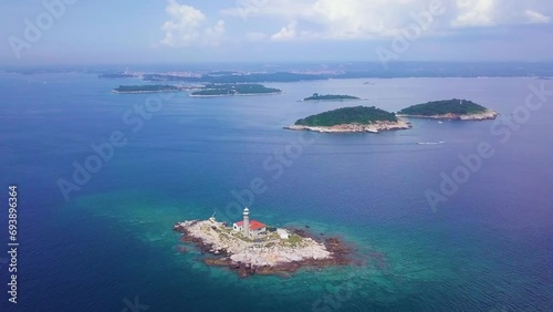 Pokonji Dol Lighthouse in Hvar island archipelago aerial view, Dalmatia region of Croatia.  photo