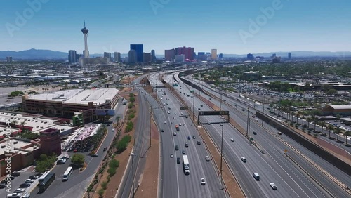 Aerial view on the Las Vegas city in Nevada, USA. Huge highways, traffic, and luxury hotels in Vegas along the Strip.
