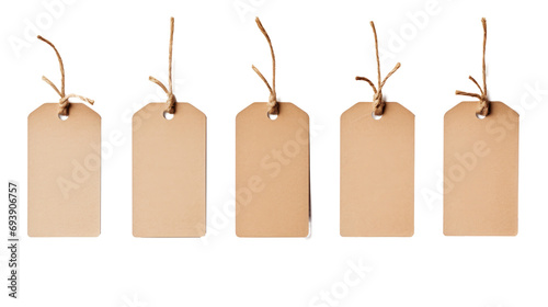 Set or collection brown natural craft kraft paper hang tags, price tags or gift tags with striped bakers twine, isolated design elements, different positions, PNG File photo