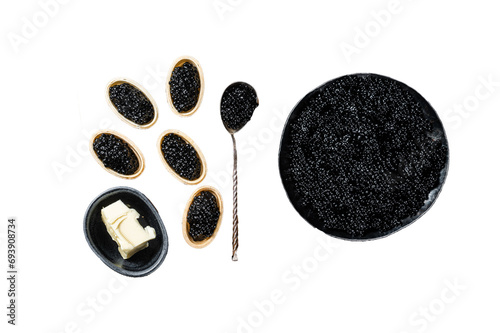 Tartlets with Sturgeon Black caviar on wooden board. Transparent background. Isolated.