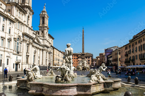 Piazza Navona with the St. Agnes in Agone church in Rome. The fountain in the foreground is the "Fountain of the Moor."